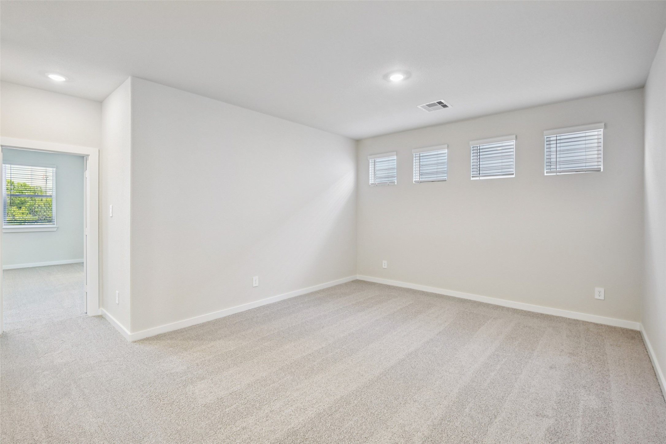 10012 Rustic Charm Street Houston, TX 77080 - Photo 31 of 45 an empty room with windows