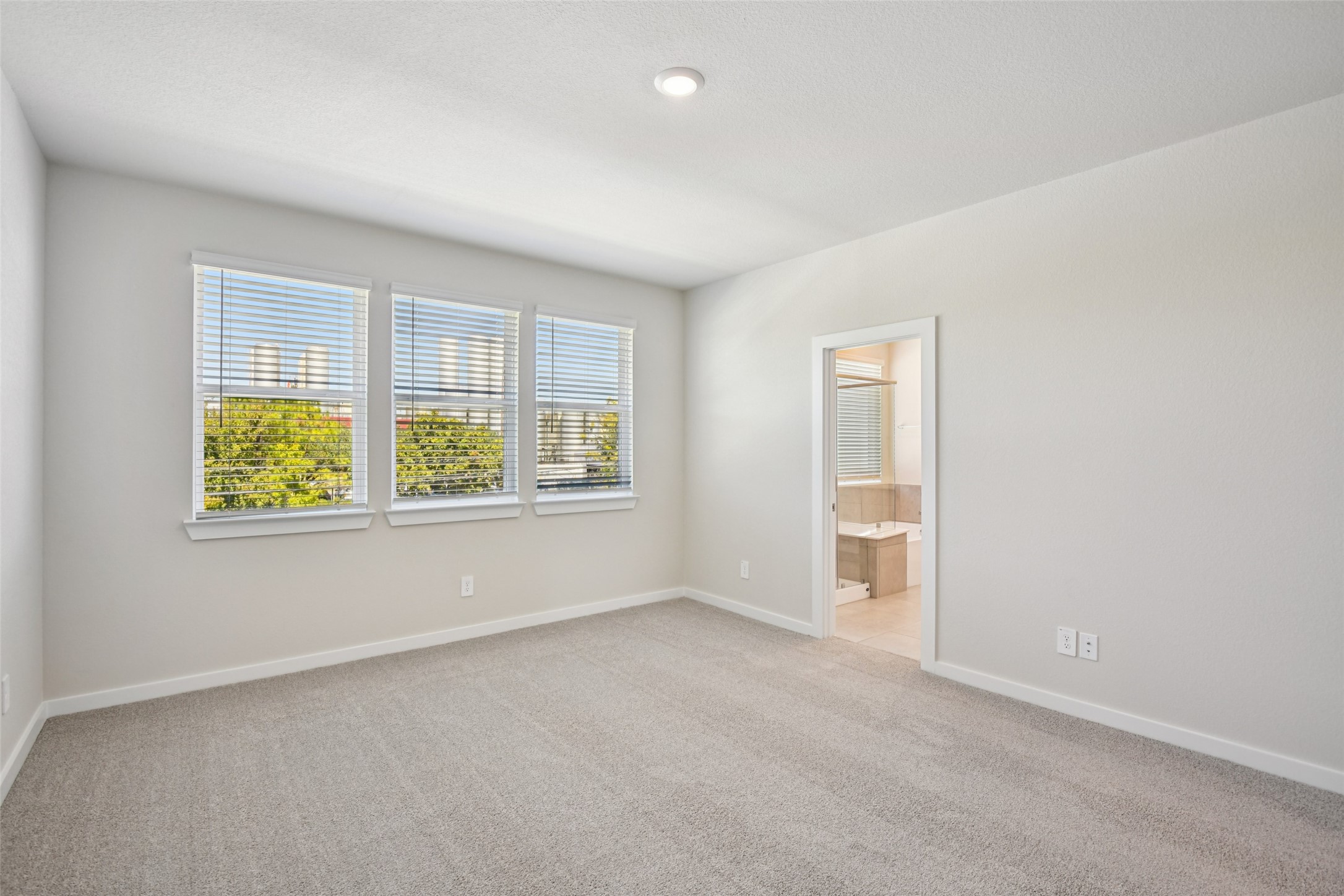 10012 Rustic Charm Street Houston, TX 77080 - Photo 35 of 45 an empty room with windows