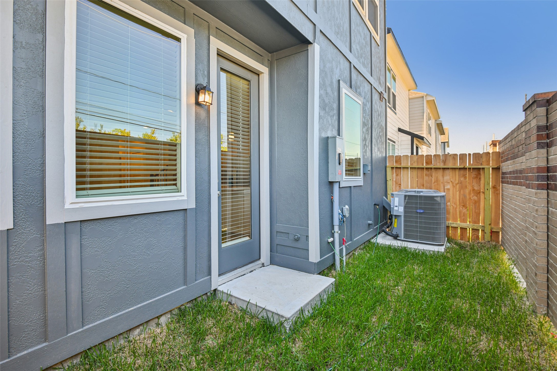 10012 Rustic Charm Street Houston, TX 77080 - Photo 42 of 45 a view of front door of house and yard