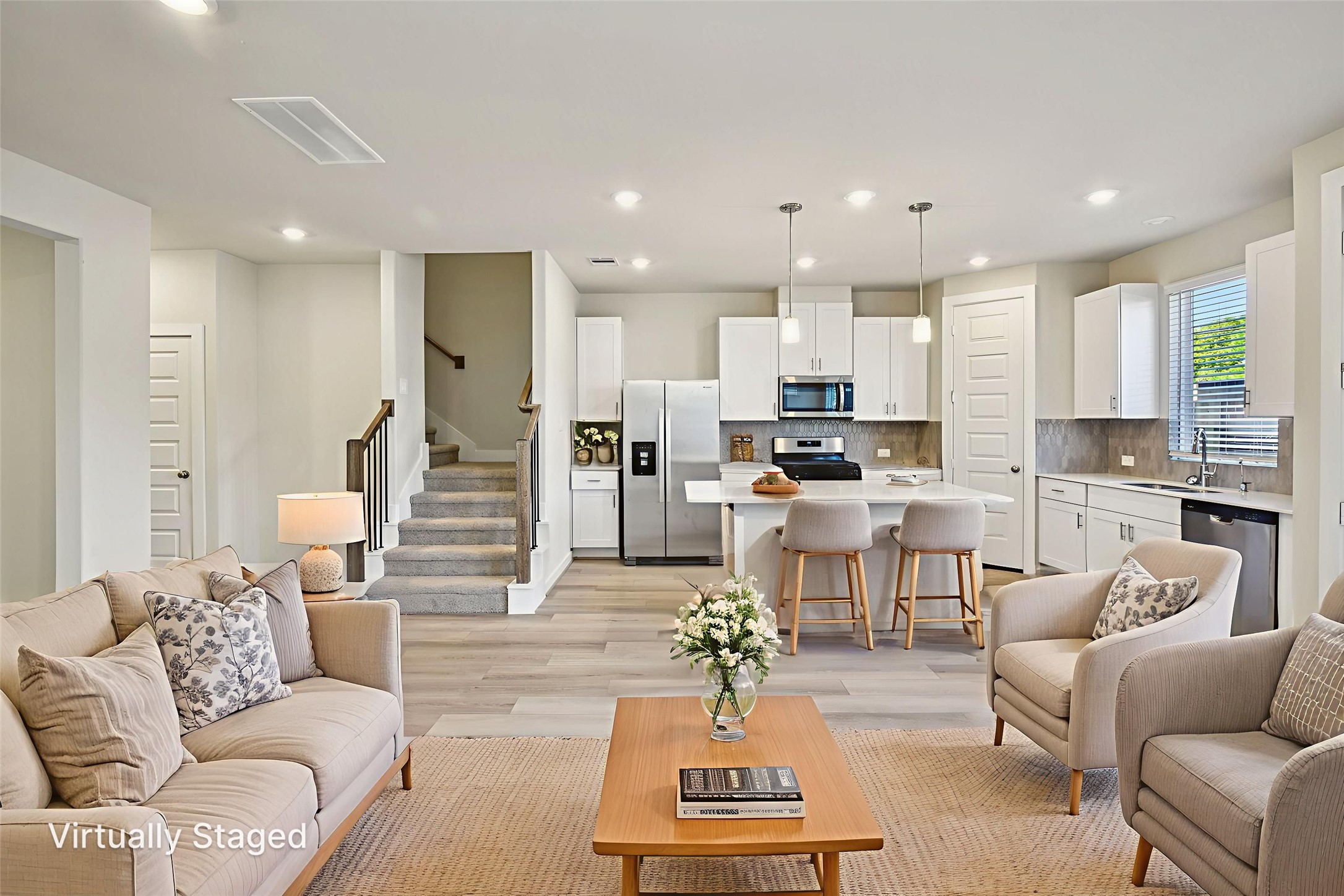 10012 Rustic Charm Street Houston, TX 77080 - Photo 8 of 45 a living room with furniture and kitchen view