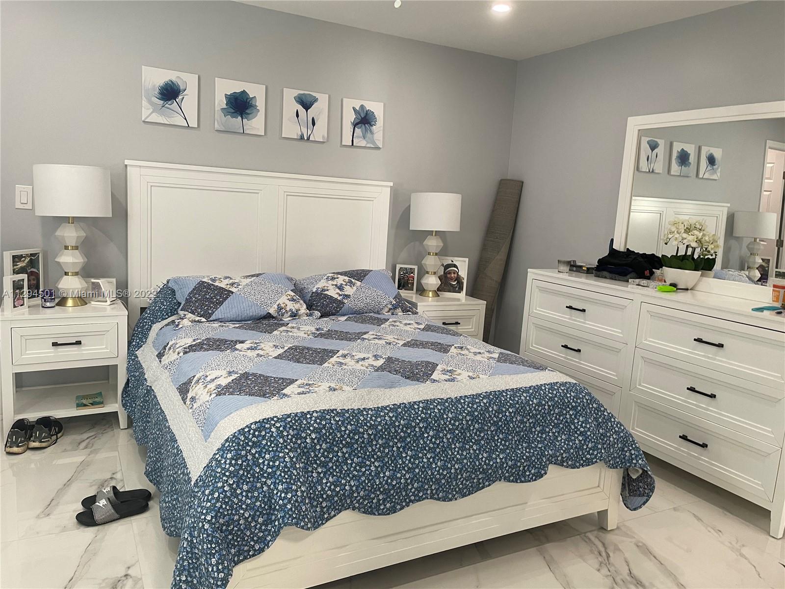 2222 Southwest 138th Avenue Miami, FL 33175 - Photo 15 of 27 a bed sitting in a bedroom and dresser