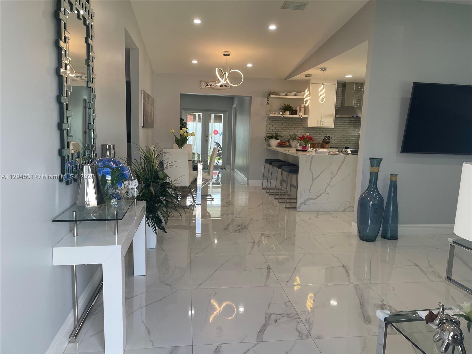 2222 Southwest 138th Avenue Miami, FL 33175 - Photo 27 of 27 a view of a living room and dining room