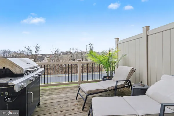 a view of a terrace with seating area