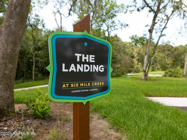 a sign on the side of the park