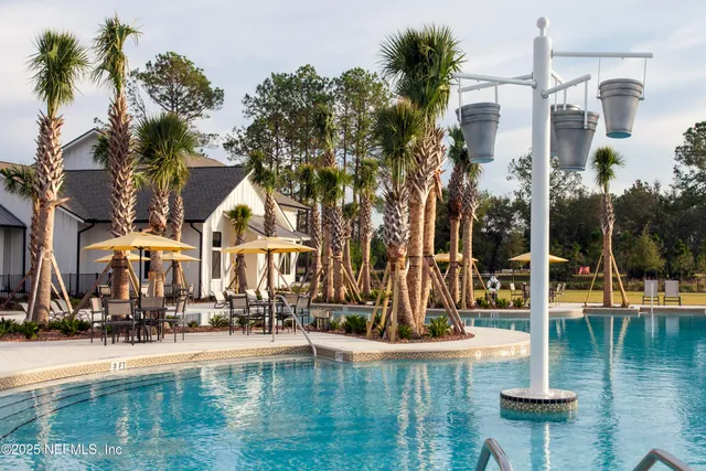 a house with river in front of it