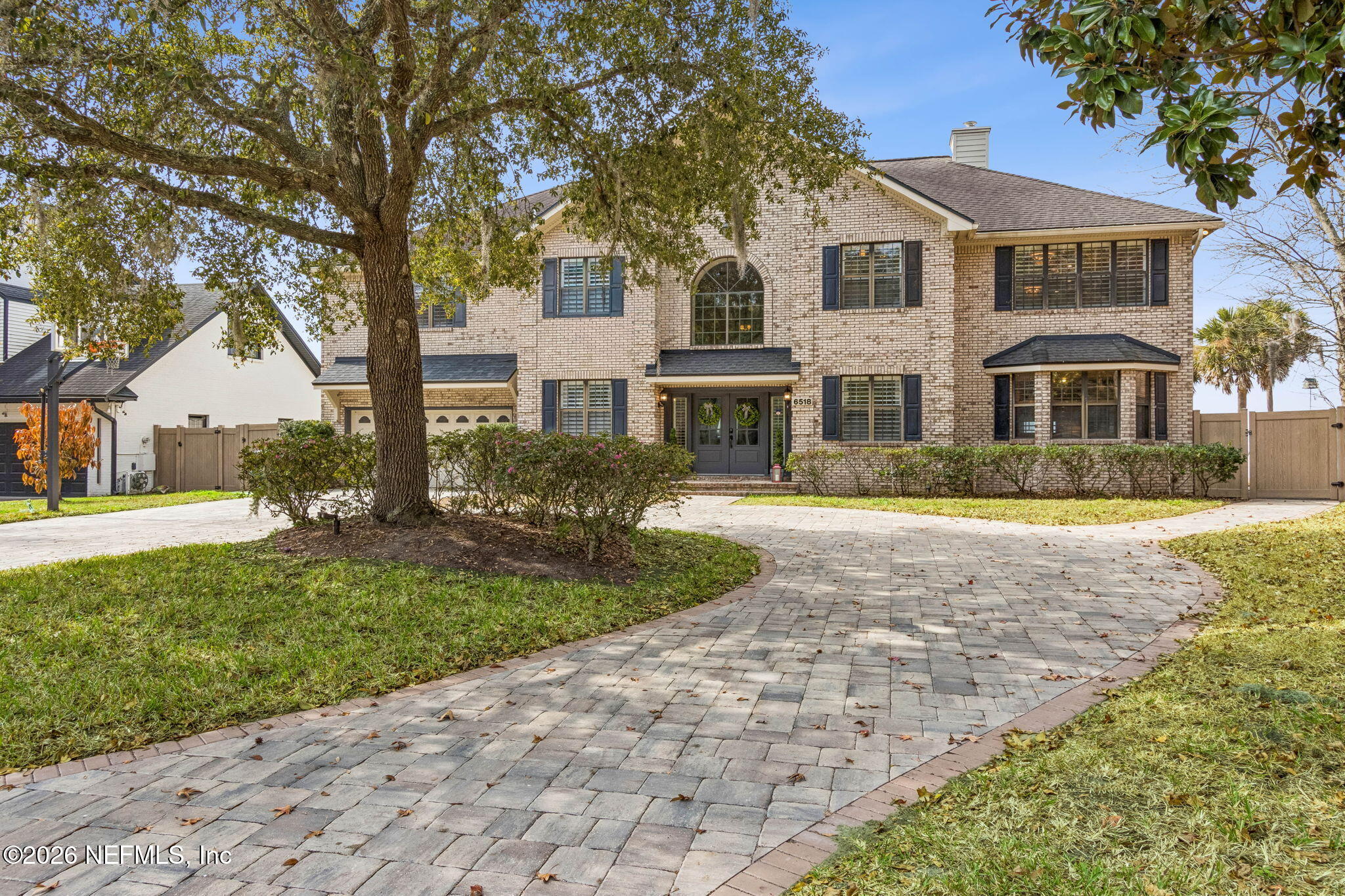 6518 Christopher Point Road West Jacksonville, FL 32217 - Photo 11 of 102 a front view of a house with a garden
