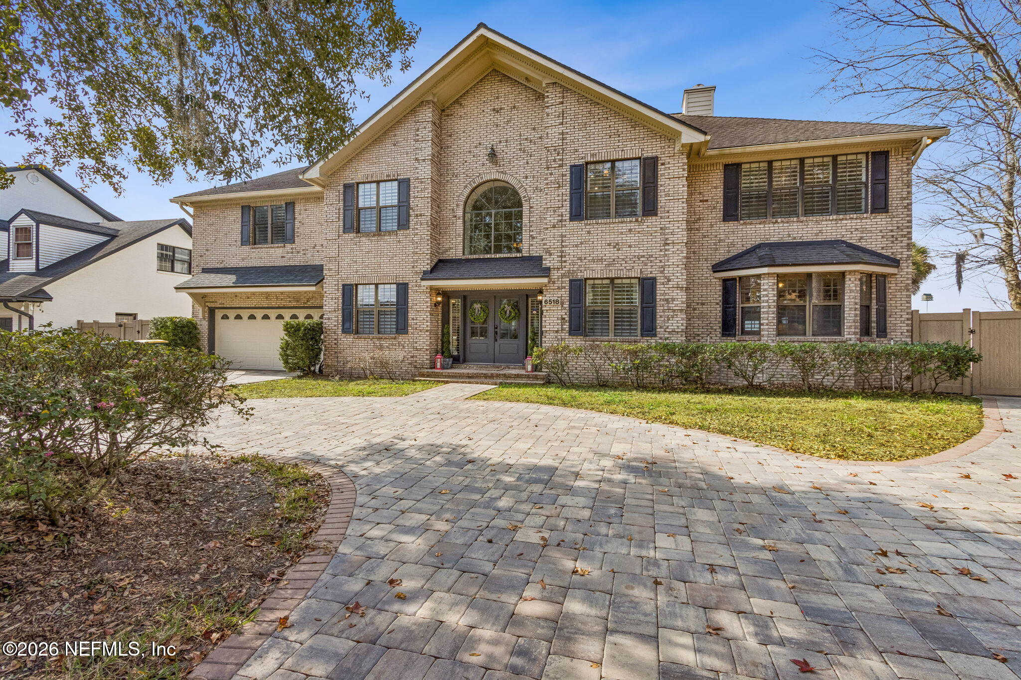 6518 Christopher Point Road West Jacksonville, FL 32217 - Photo 13 of 102 a front view of a house with a yard