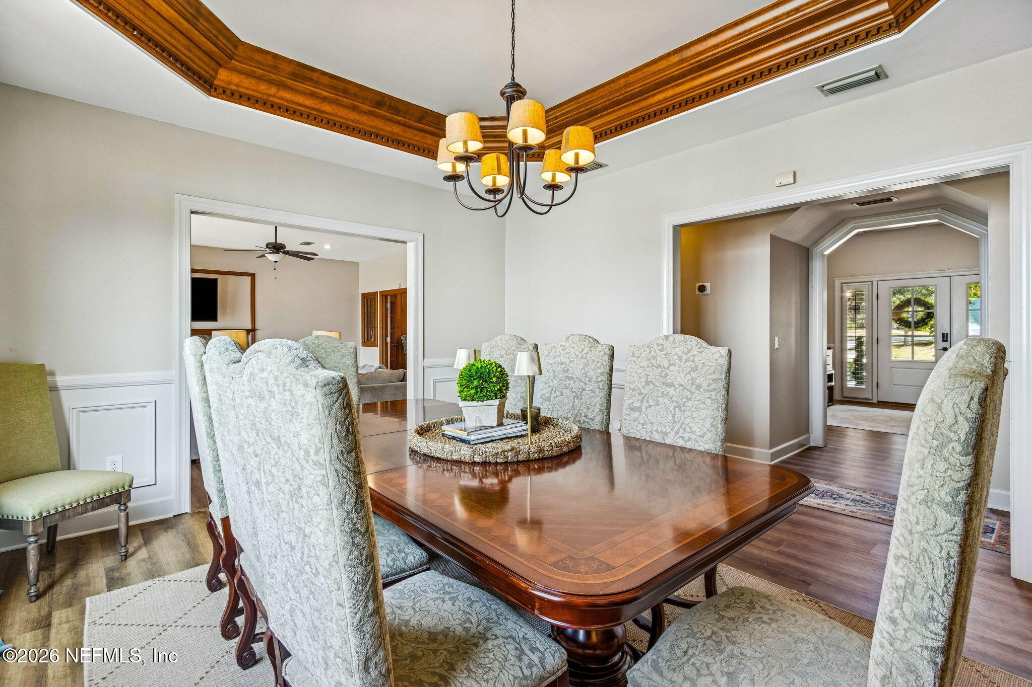 6518 Christopher Point Road West Jacksonville, FL 32217 - Photo 29 of 102 a view of a dining room with furniture and wooden floor