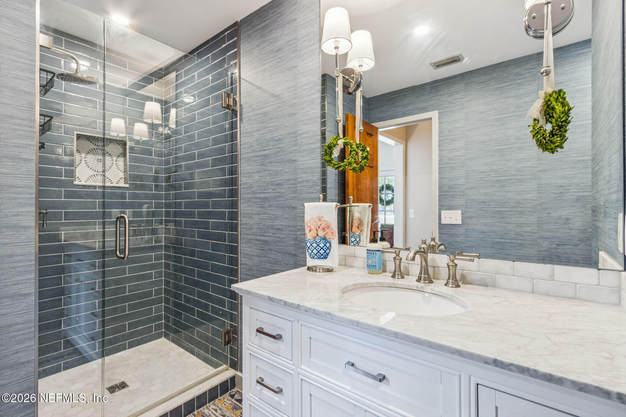 6518 Christopher Point Road West Jacksonville, FL 32217 - Photo 42 of 102 a bathroom with a granite countertop sink a toilet and mirror