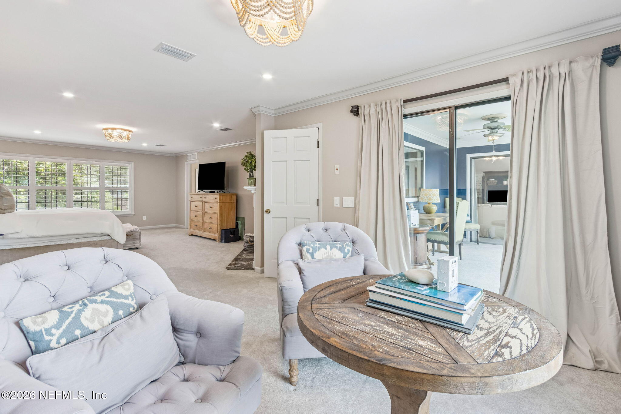 6518 Christopher Point Road West Jacksonville, FL 32217 - Photo 51 of 102 a living room with furniture and a large window