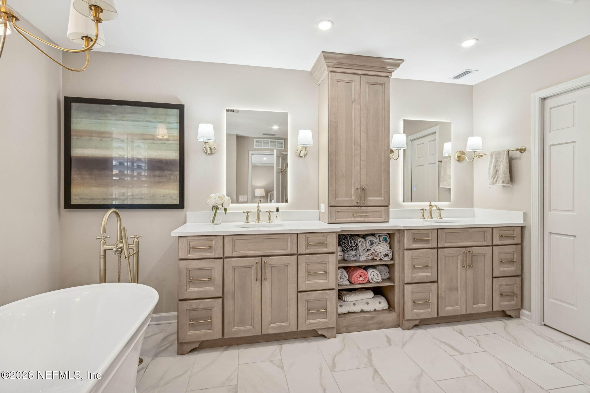 6518 Christopher Point Road West Jacksonville, FL 32217 - Photo 7 of 102 a bathroom with a double vanity sink mirror and bathtub