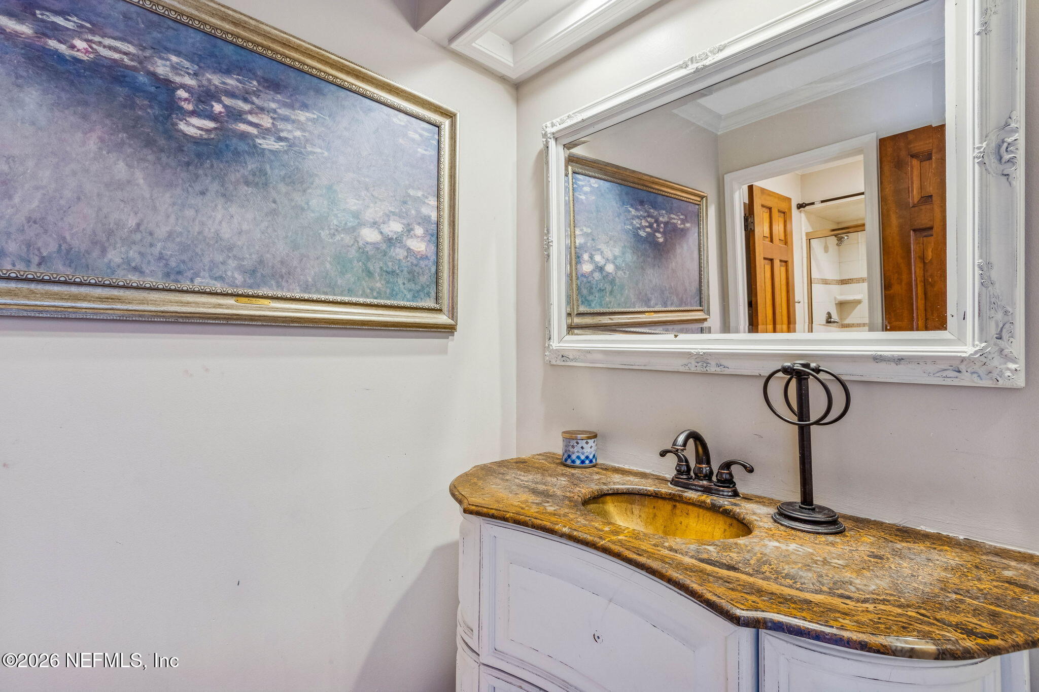6518 Christopher Point Road West Jacksonville, FL 32217 - Photo 73 of 102 a bathroom with a granite countertop sink and a window