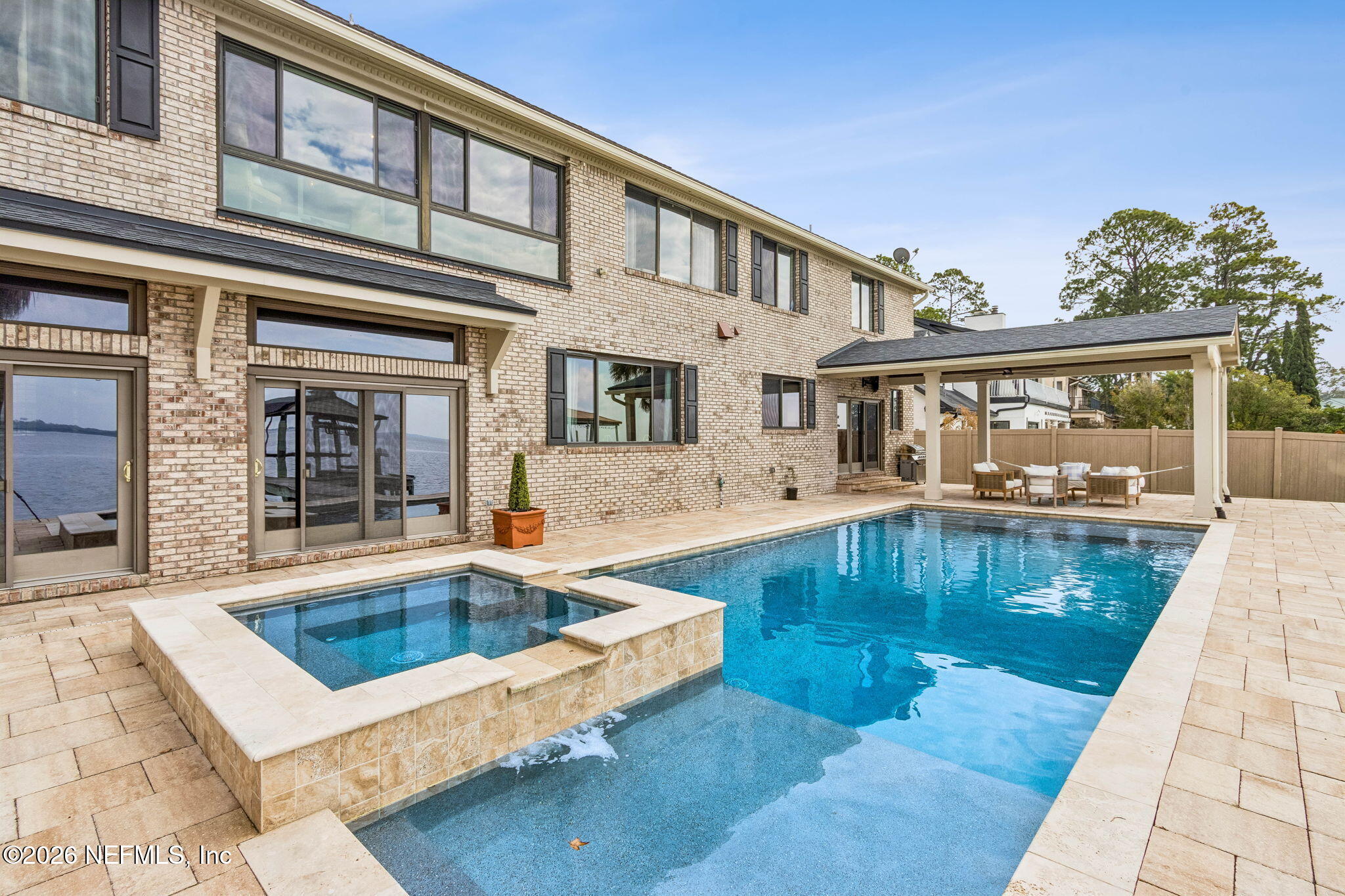 6518 Christopher Point Road West Jacksonville, FL 32217 - Photo 79 of 102 front view of a house with swimming pool