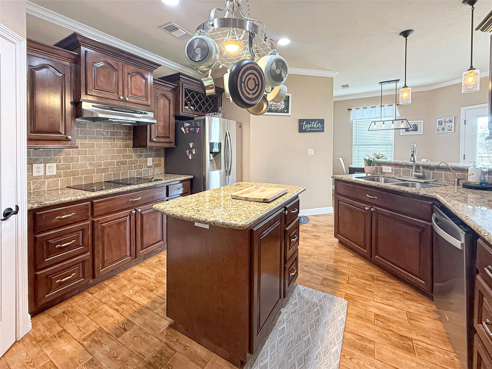 807 Mill Road Angleton, TX 77515 - Photo 18 of 46 Custom cabinetry offers exceptional storage and timeless craftsmanship.