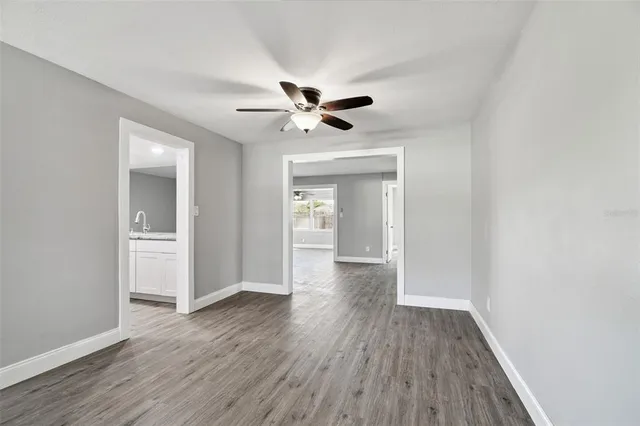 a kitchen with a sink stove and refrigerator