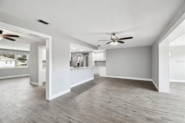 a bathroom with a sink toilet and mirror