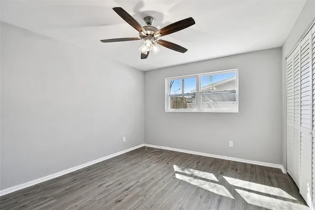 a view of the backyard of the house