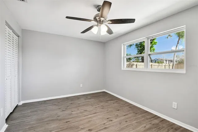 a view of a house with a yard and garage