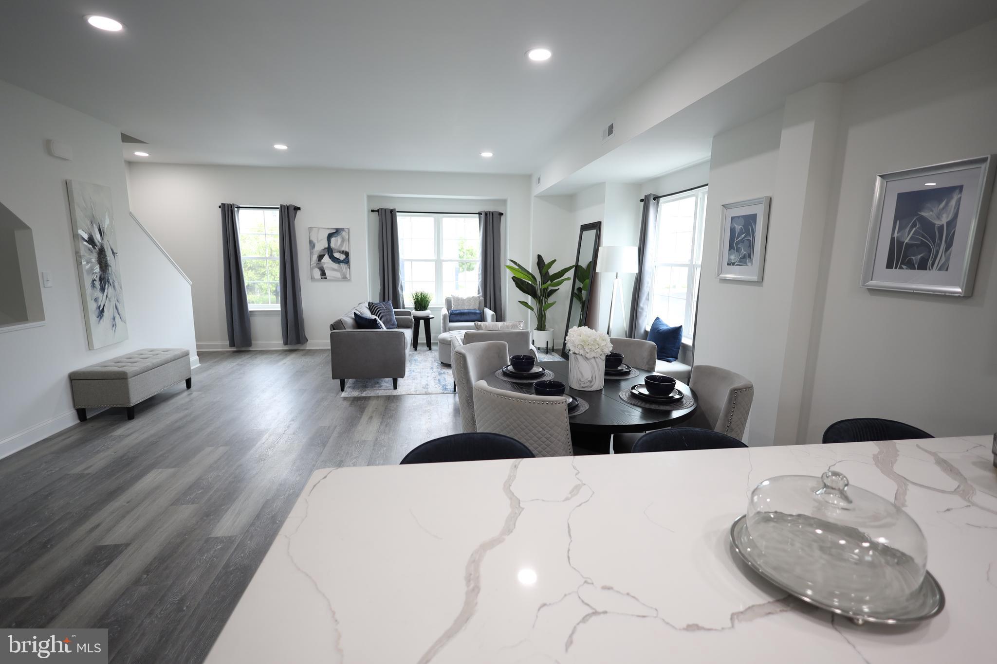 3316 North Market Street Wilmington, DE 19802 - Photo 12 of 40 a living room with furniture and a wooden floor