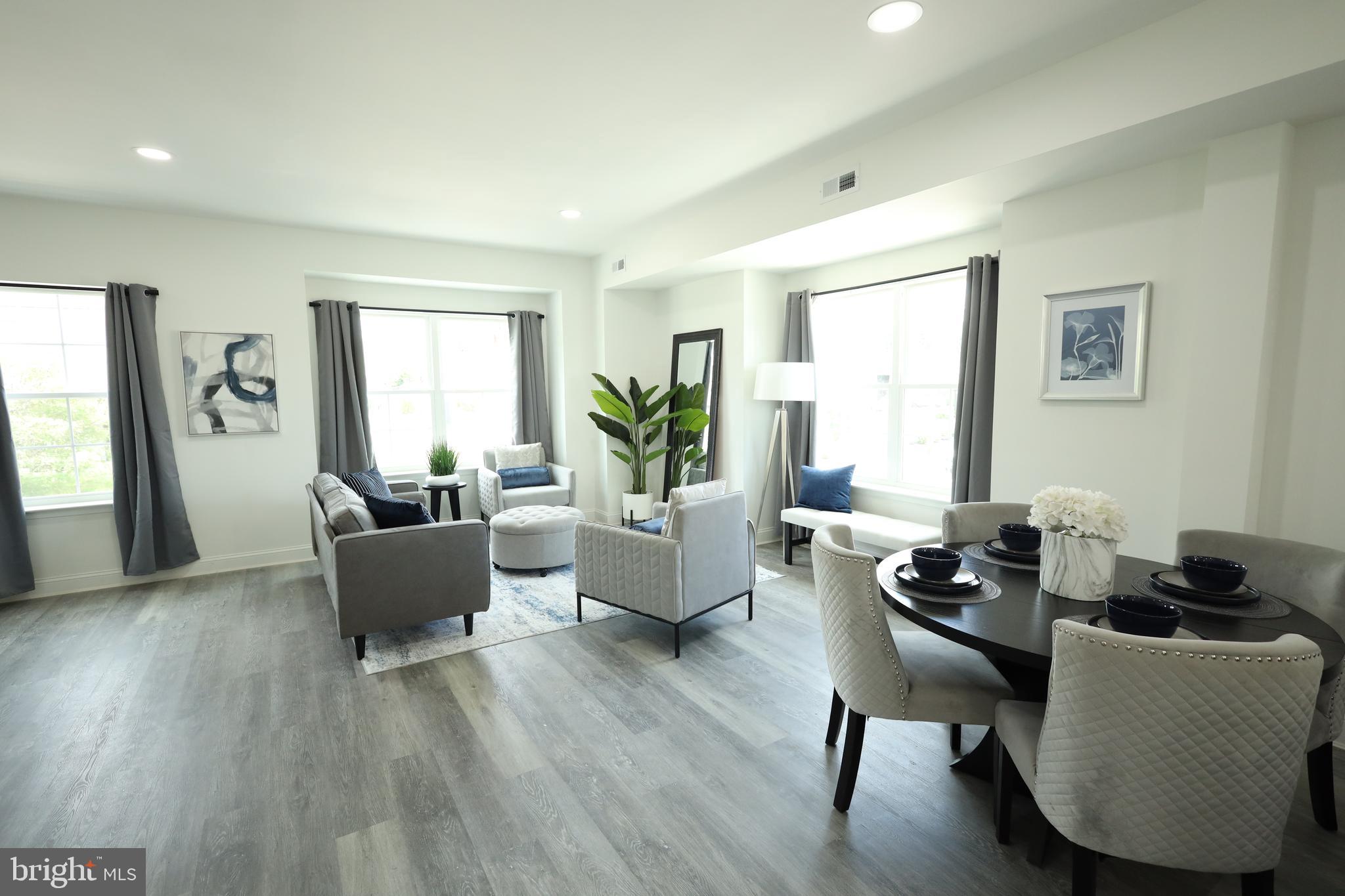 3316 North Market Street Wilmington, DE 19802 - Photo 14 of 40 a living room with fireplace furniture and a wooden floor