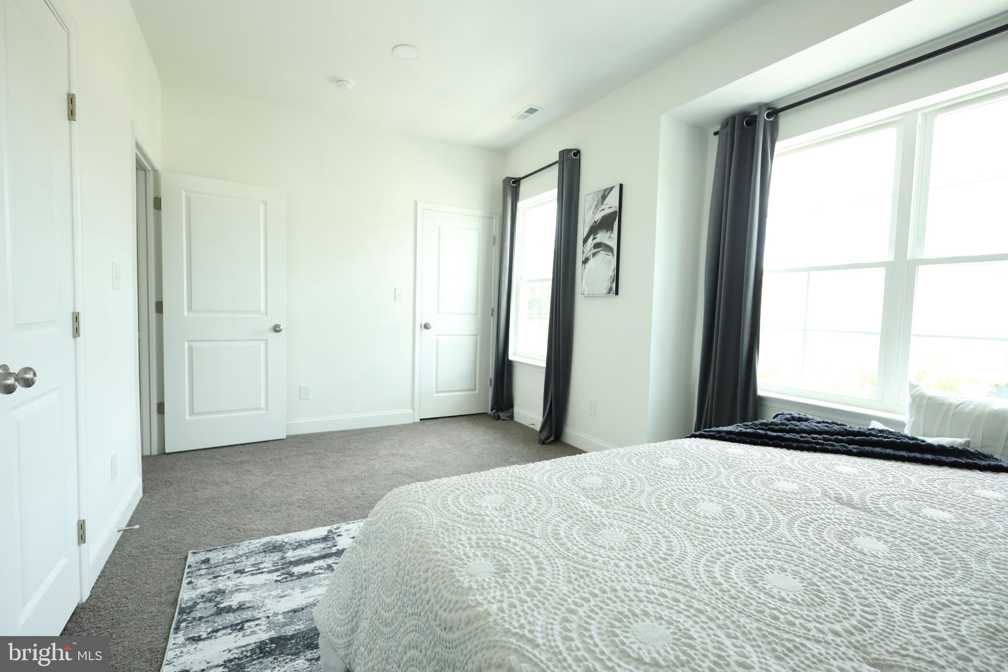 3316 North Market Street Wilmington, DE 19802 - Photo 24 of 40 a bedroom with a bed and a window