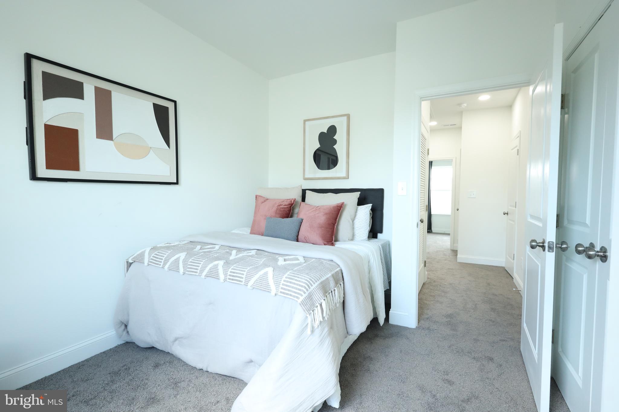 3316 North Market Street Wilmington, DE 19802 - Photo 27 of 40 a bed room with a bed and a painting