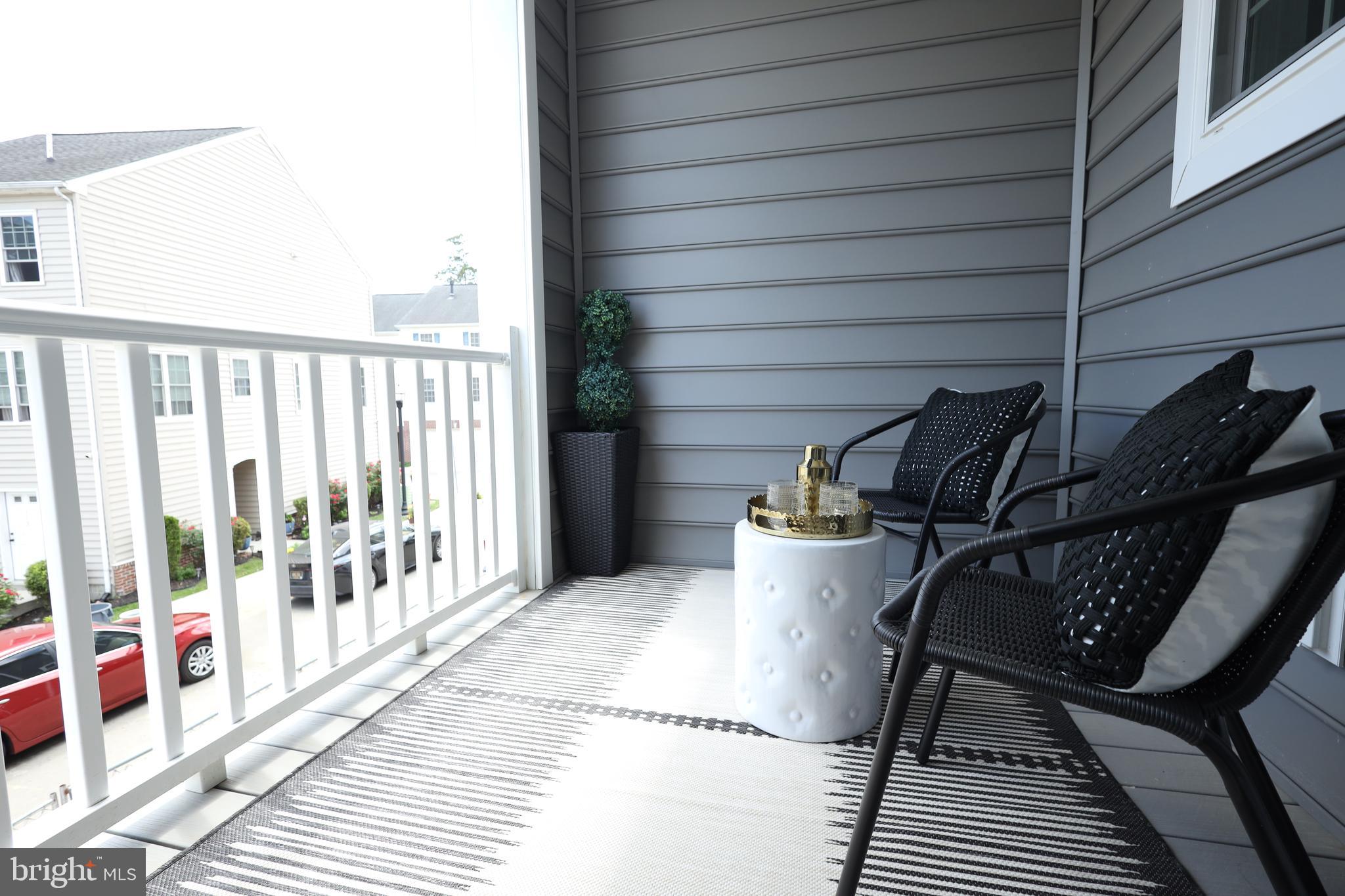 3316 North Market Street Wilmington, DE 19802 - Photo 10 of 40 a balcony view with a couple of chairs