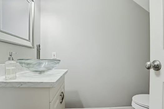108 Inverness Conroe, TX 77356 - Photo 14 of 29 a bathroom with a sink and toilet
