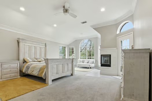 108 Inverness Conroe, TX 77356 - Photo 18 of 29 a bed room with a bed and a chair