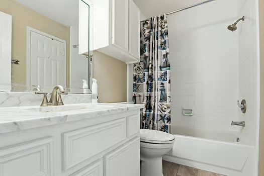 108 Inverness Conroe, TX 77356 - Photo 22 of 29 a bathroom with a sink a toilet and shower