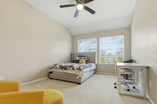 108 Inverness Conroe, TX 77356 - Photo 26 of 29 a bedroom with a bed and a window