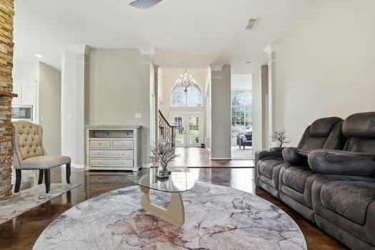 108 Inverness Conroe, TX 77356 - Photo 8 of 29 a living room with furniture and a large window