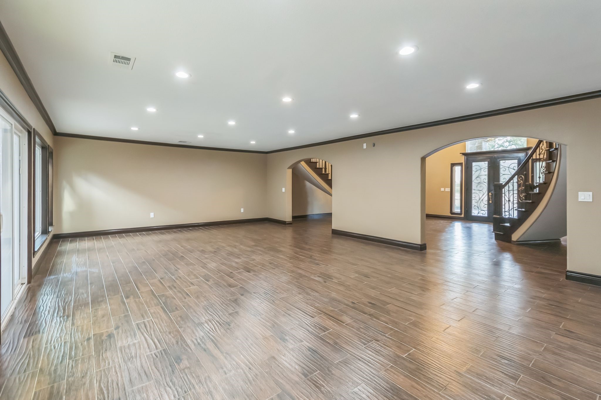 24578 Derry Street Hempstead, TX 77445 - Photo 7 of 50 Main living area is incredibly spacious with multiple ways to place furniture and make this feel like home!