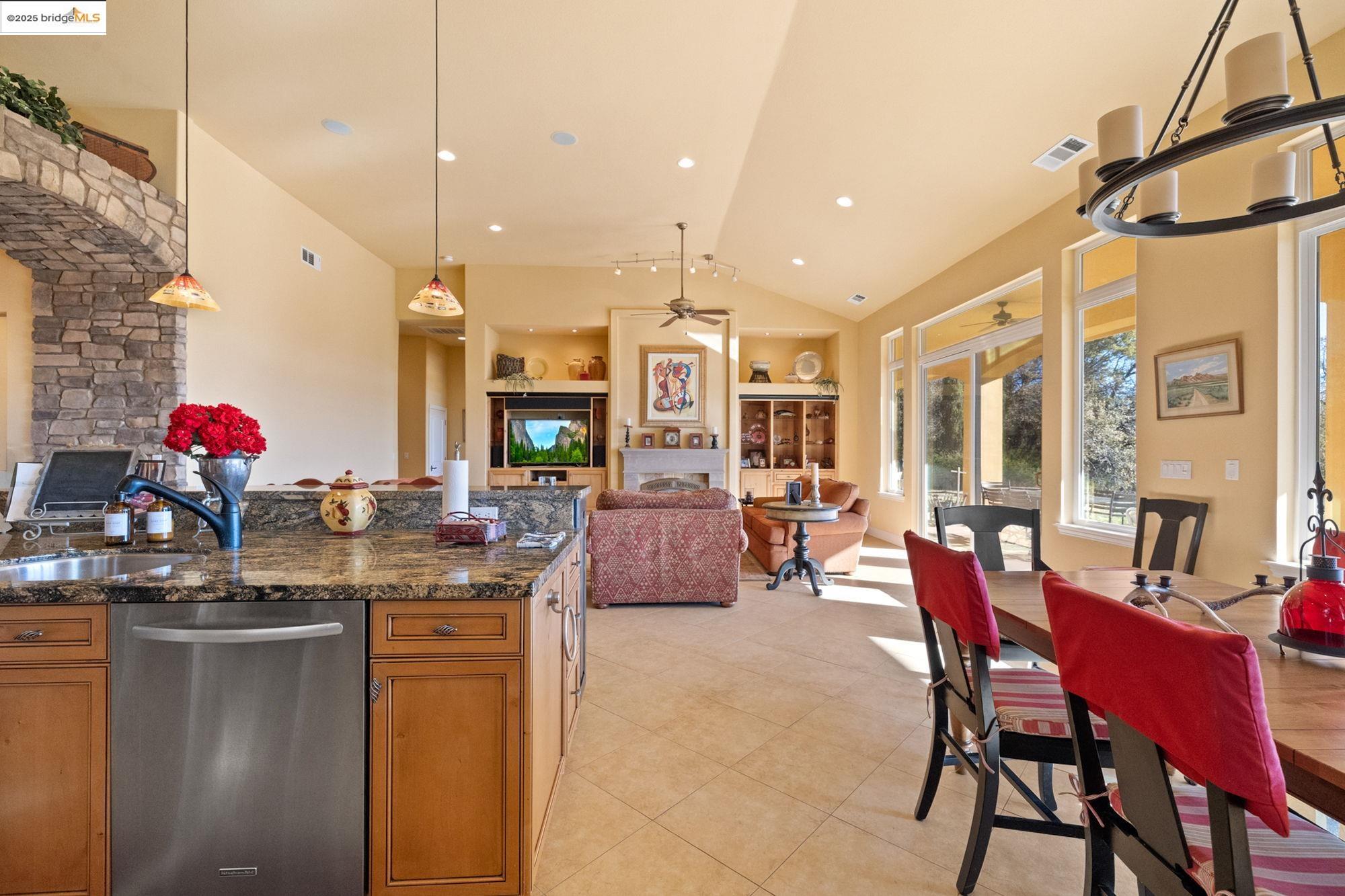 21190 Lyons Bald Mountain Road Sonora, CA 95370 - Photo 11 of 49 a view of a dining room with furniture and window