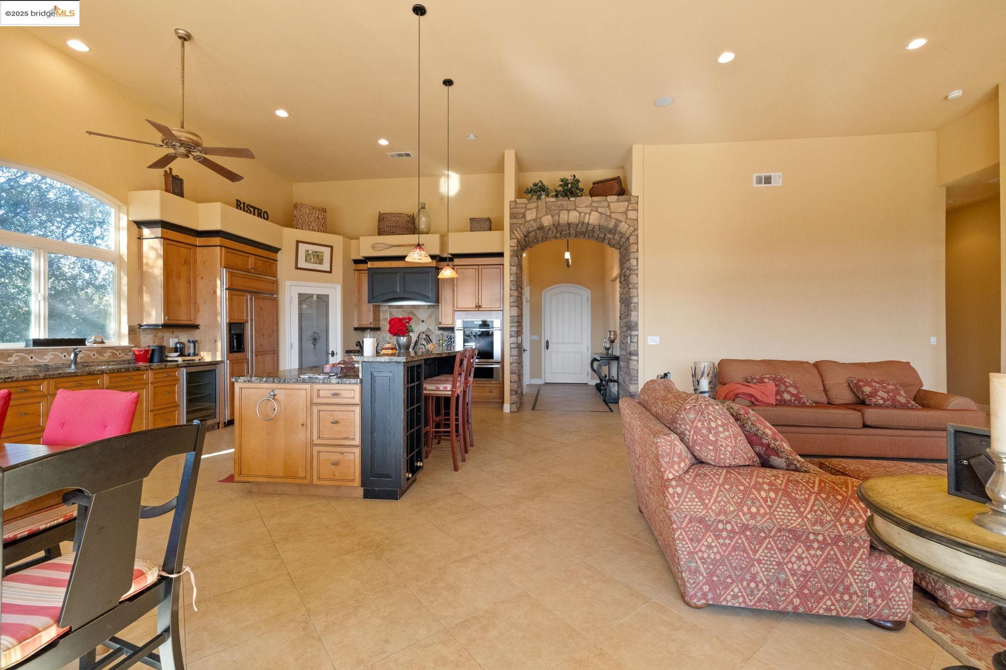 21190 Lyons Bald Mountain Road Sonora, CA 95370 - Photo 18 of 49 a living room with furniture and a chandelier