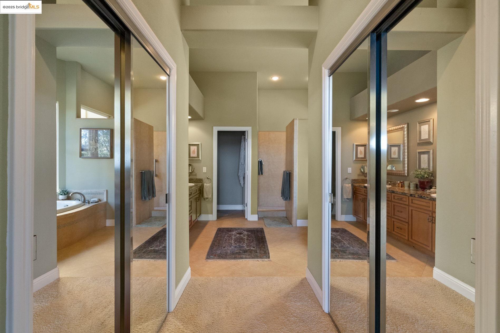 21190 Lyons Bald Mountain Road Sonora, CA 95370 - Photo 22 of 49 a bathroom with a glass shower door