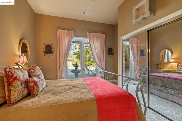 a bathroom with a granite countertop sink toilet a mirror a vanity and shower