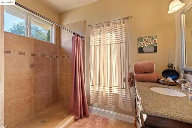 a view of a balcony with chair and front door