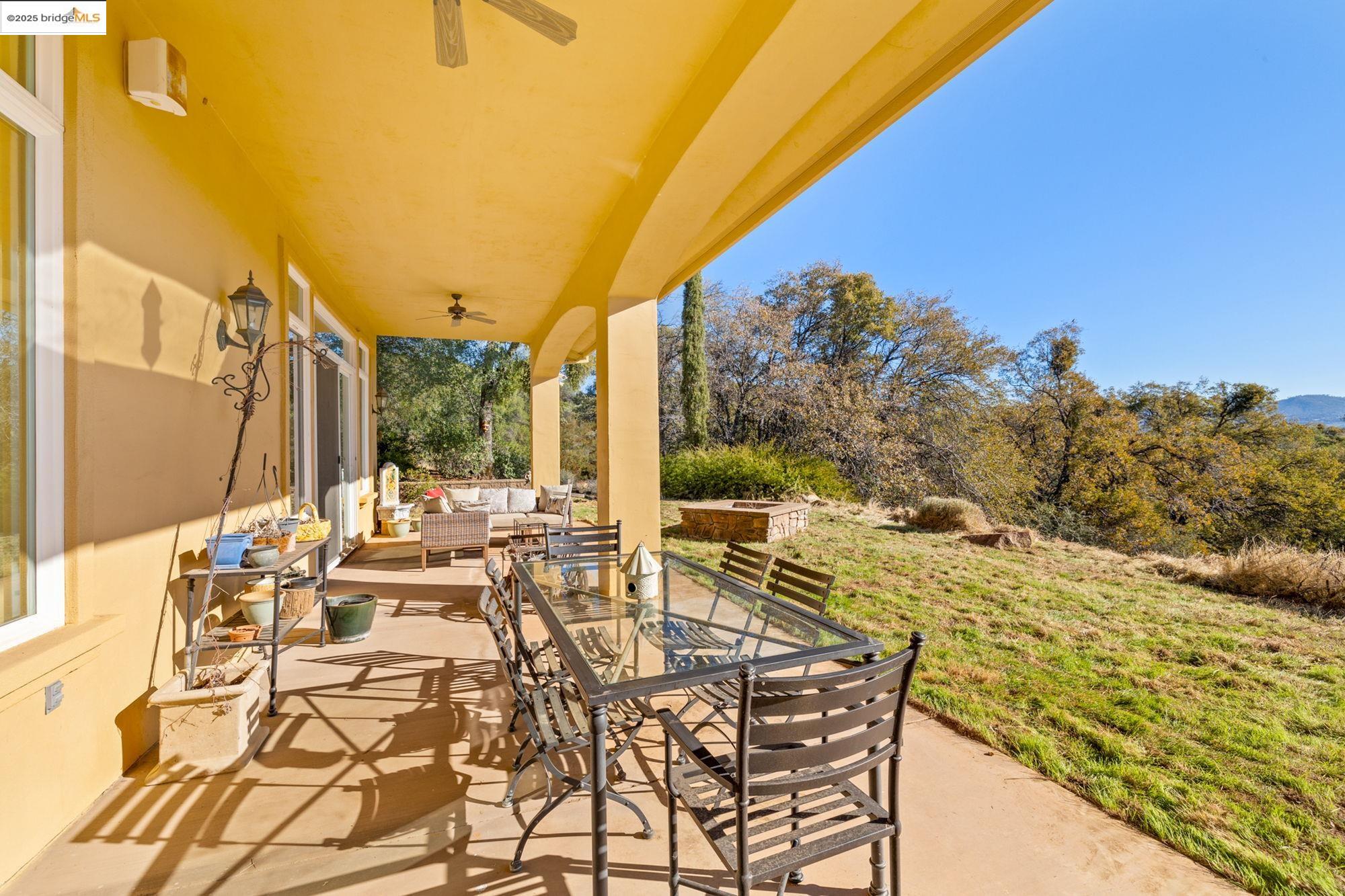 21190 Lyons Bald Mountain Road Sonora, CA 95370 - Photo 36 of 49 a view of an outdoor space with seating area
