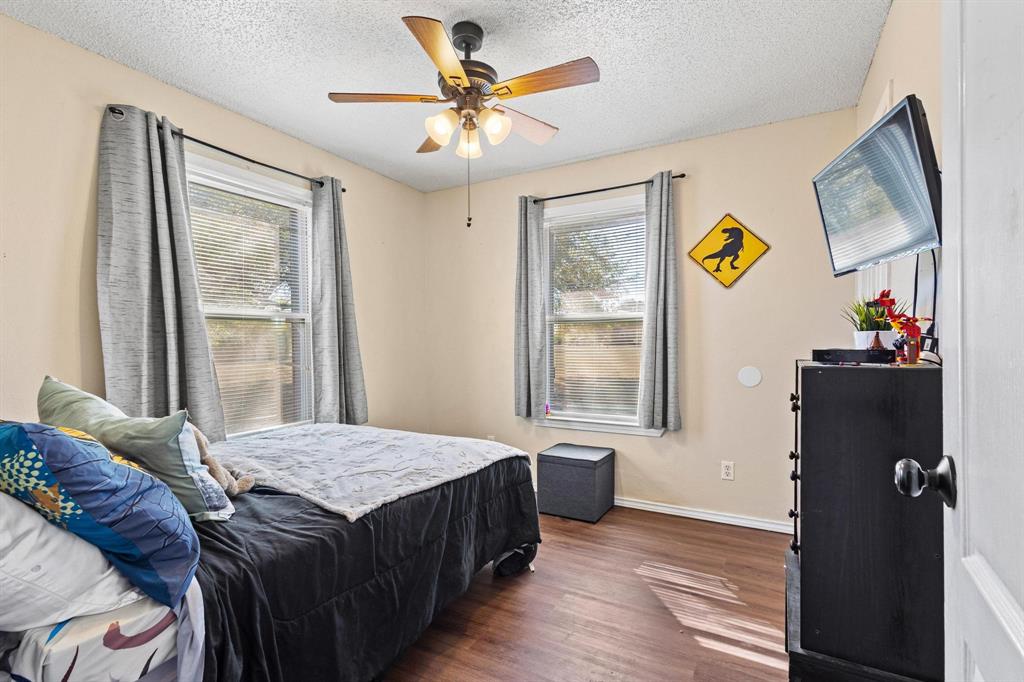 625 County Road Paris, TX 75462 - Photo 13 of 31 a bedroom with a bed and a window
