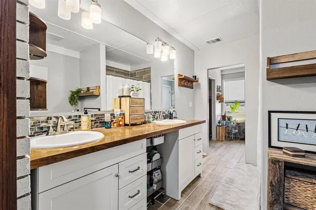a utility room with closet dryer and washer