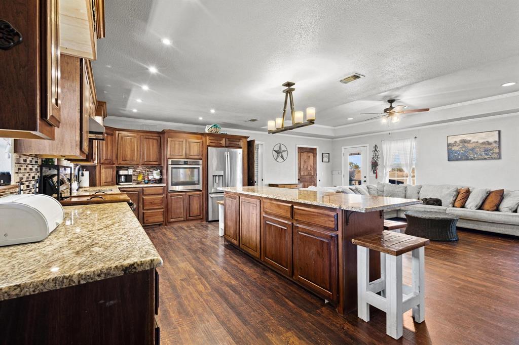 625 County Road Paris, TX 75462 - Photo 31 of 31 a kitchen with granite countertop lots of counter top space