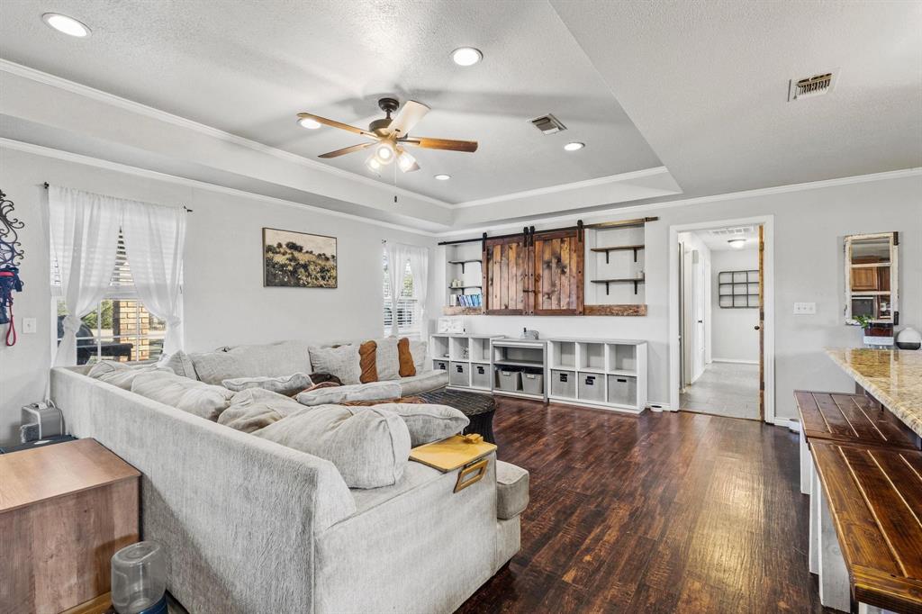 625 County Road Paris, TX 75462 - Photo 8 of 31 a living room with furniture and wooden floor