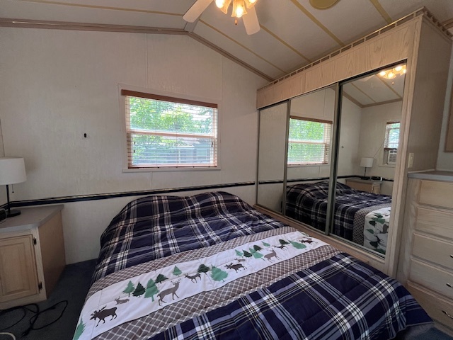 2795 28th Lot 1479 & 1480 Road Seneca, IL 61360 - Photo 11 of 66 a bed sitting in a bedroom next to a window