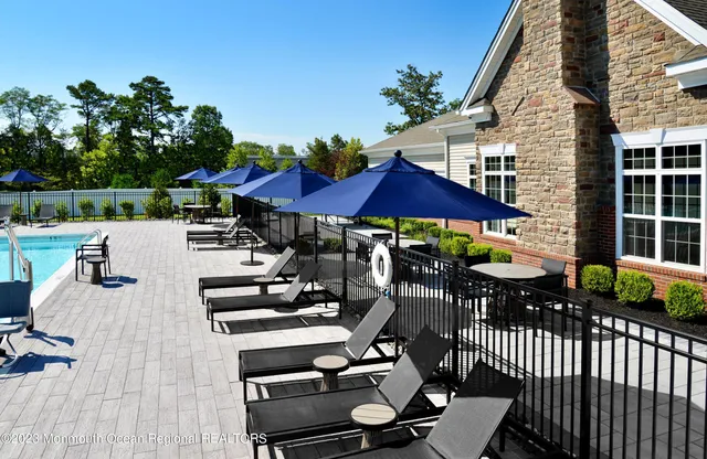 a view of a patio with wooden floor