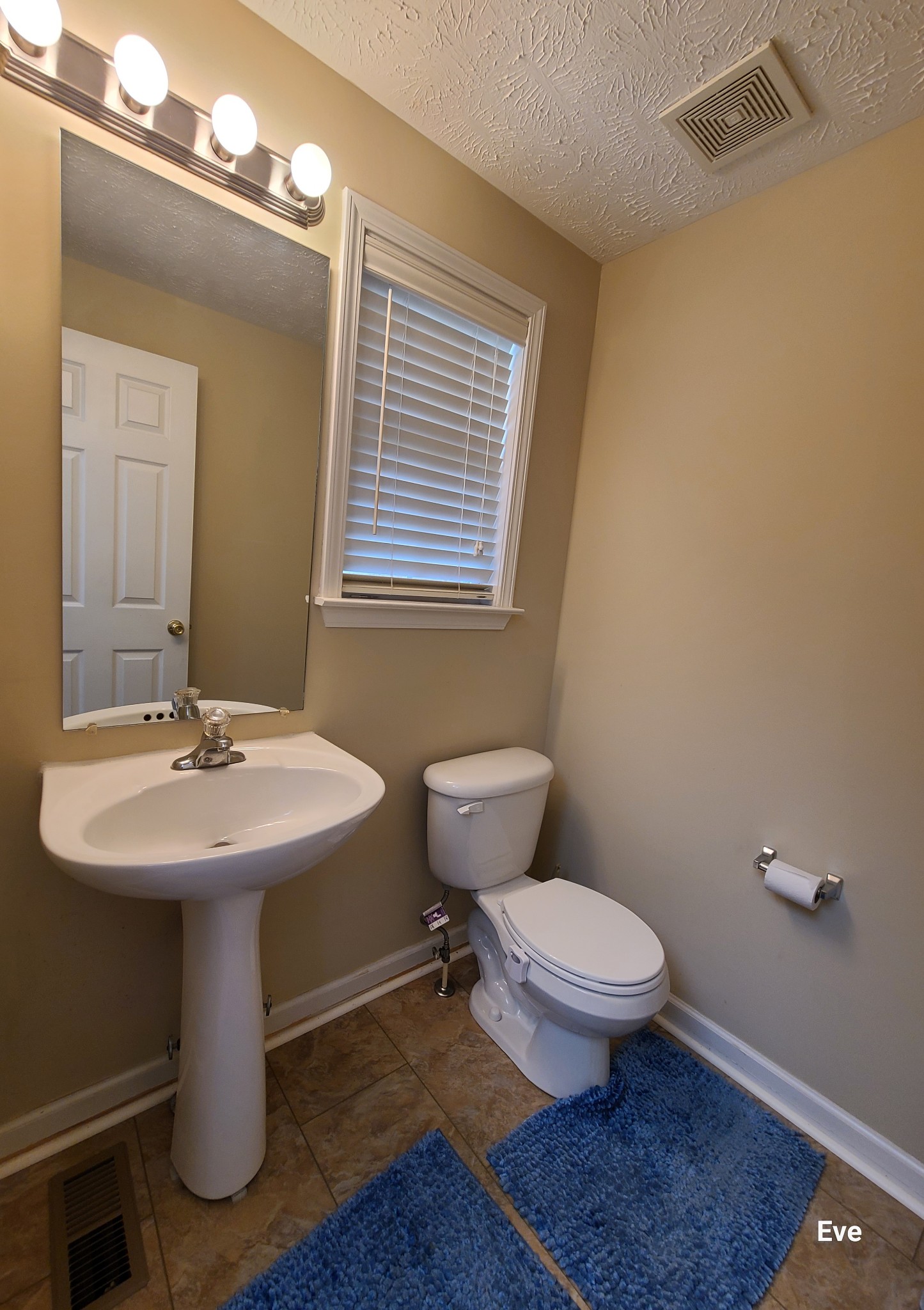 1232 Canyon Ridge Court Antioch, TN 37013 - Photo 13 of 41 a bathroom with a sink a toilet and mirror