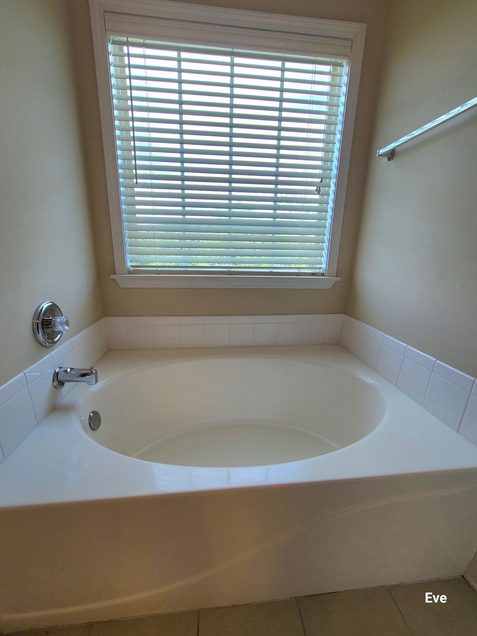 1232 Canyon Ridge Court Antioch, TN 37013 - Photo 19 of 41 a bathroom with a bathtub and next to a window