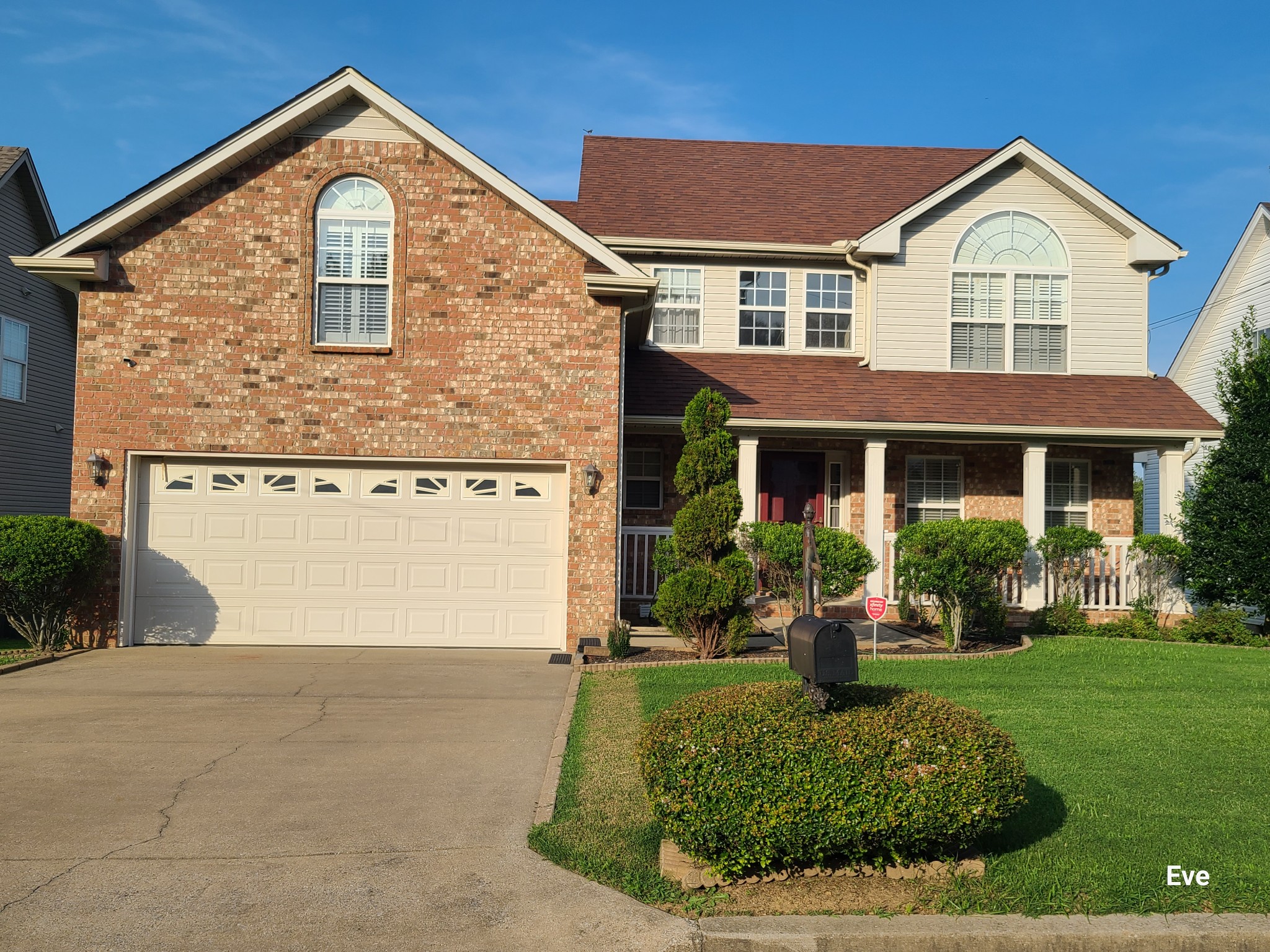 1232 Canyon Ridge Court Antioch, TN 37013 - Photo 2 of 41 a front view of a house with a yard and garage