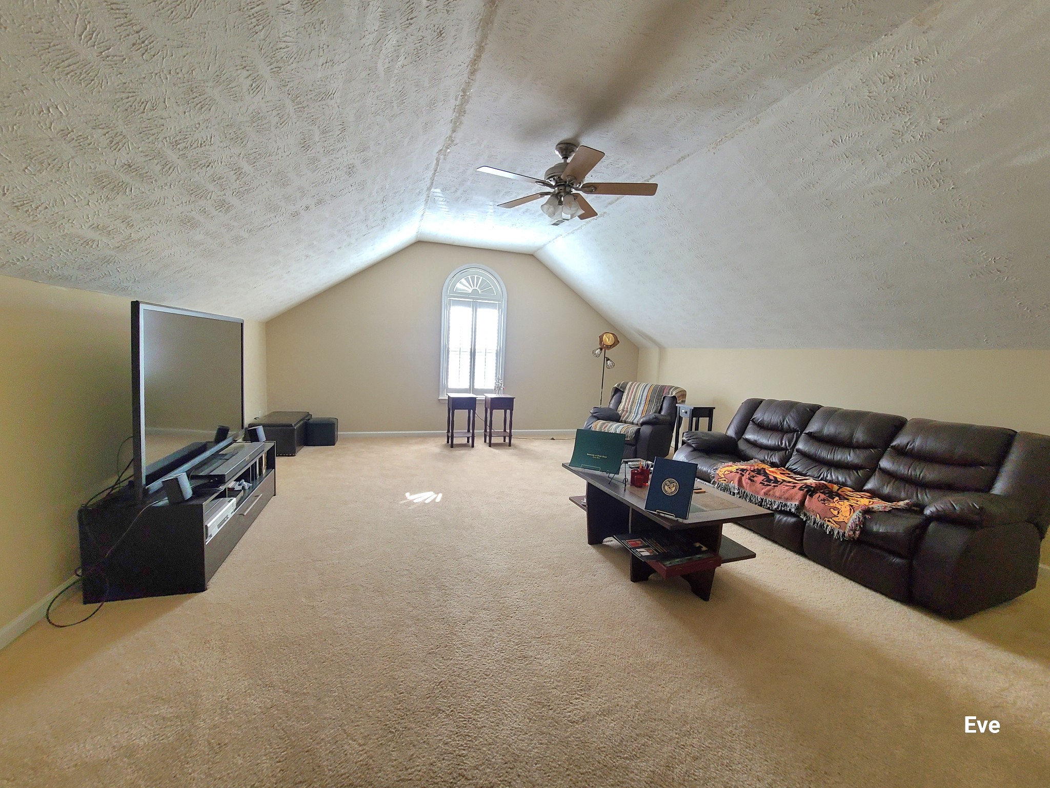 1232 Canyon Ridge Court Antioch, TN 37013 - Photo 30 of 41 a living room with furniture a chandelier and a flat screen tv
