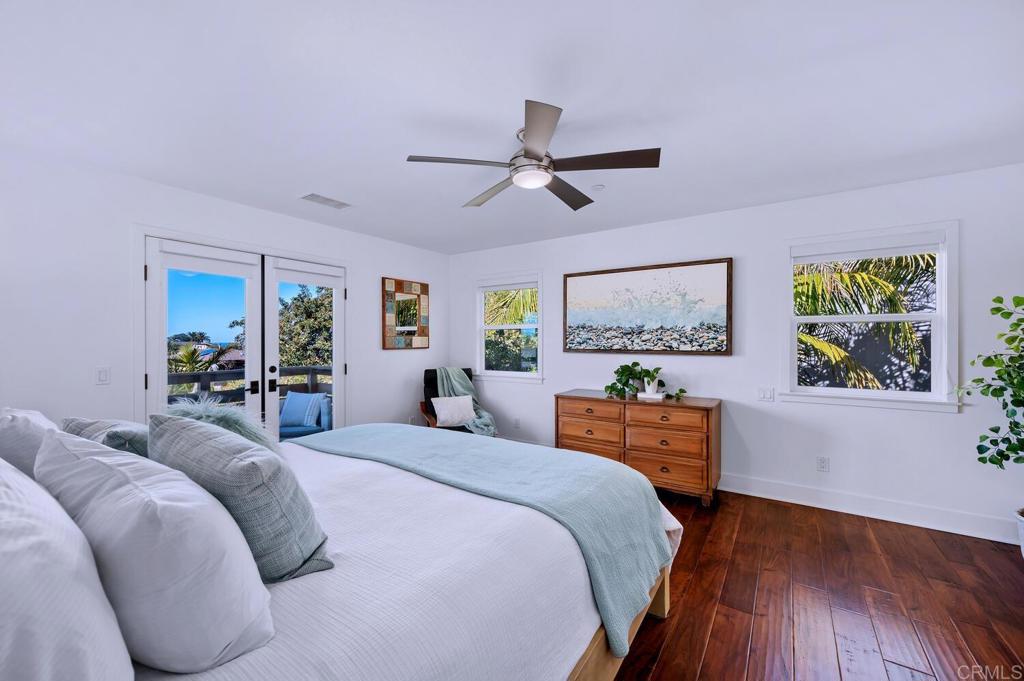 647 Arden Drive Encinitas, CA 92024 - Photo 17 of 36 a bed room with a bed and a dresser